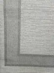 Juno carpet close-up of corner with sharp geometric border design