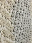 Side-angled close-up of Crater rug with textured pattern