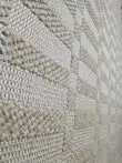 Textured close-up of Umbra rug’s raised patterns.