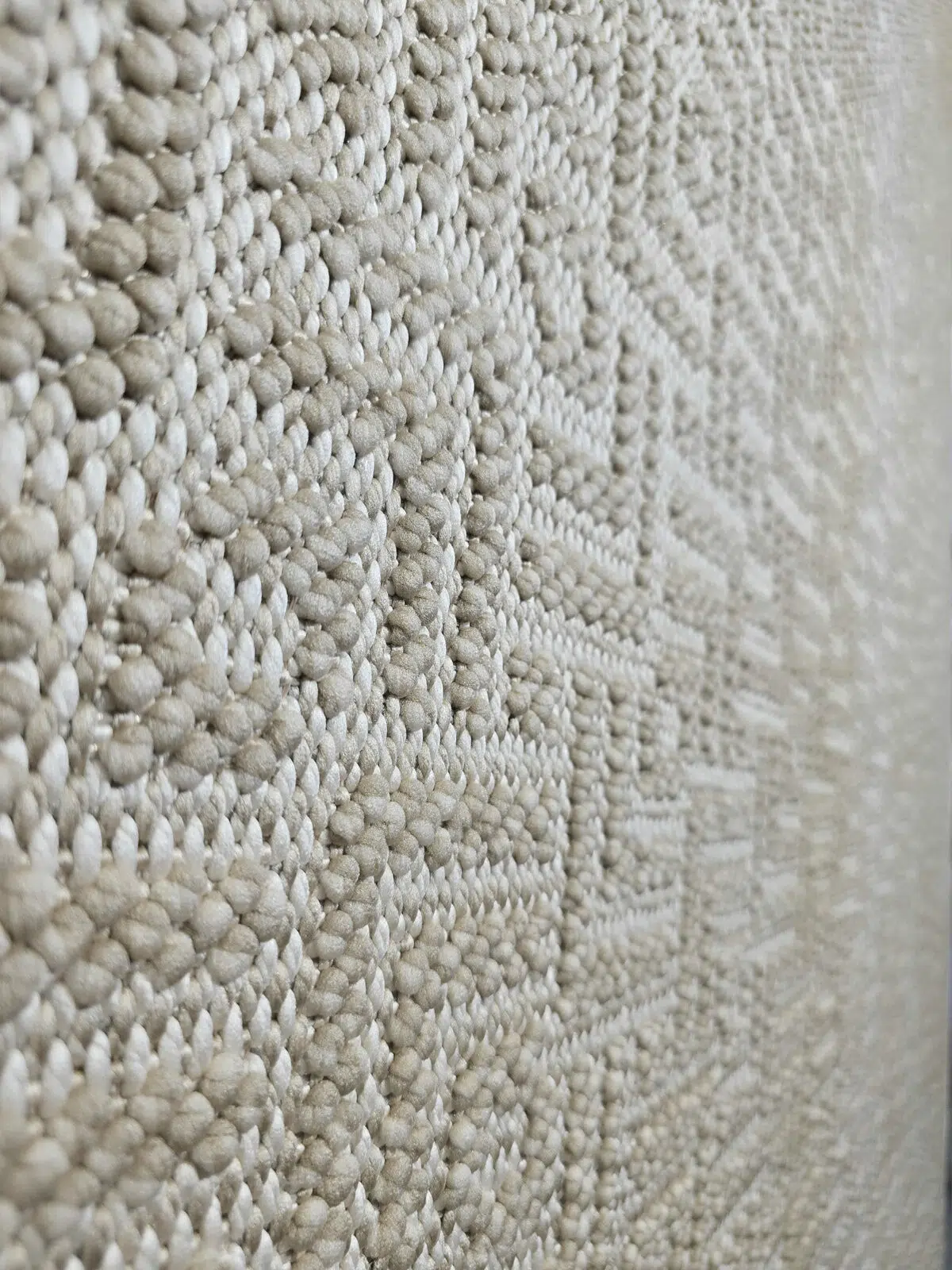 Angled detail showing Oberon rug’s minimalist surface