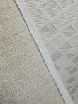 View of Mars rug backing and edge binding for durability
