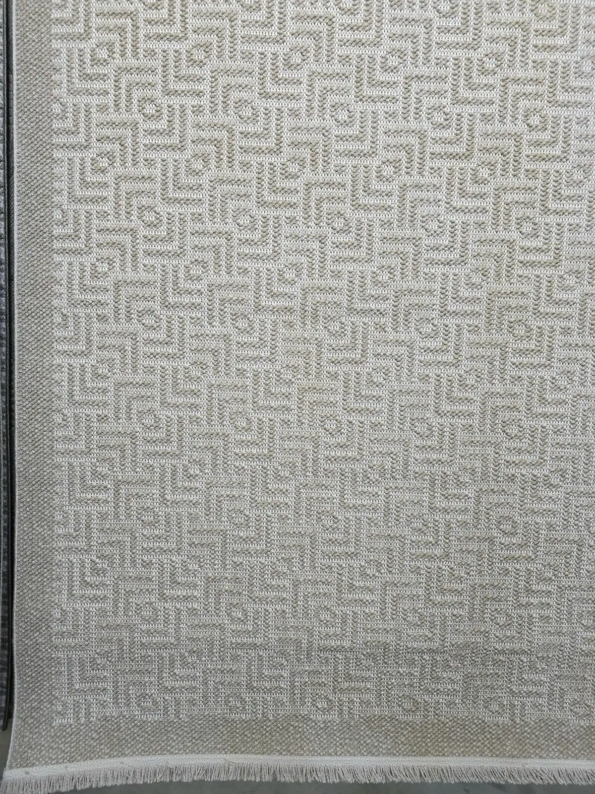 Creative side angle of Oberon rug’s modern woven design
