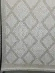 Detailed bottom part of Nocturne rug with fringes