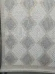 Bottom part of Crater rug with fringes and border