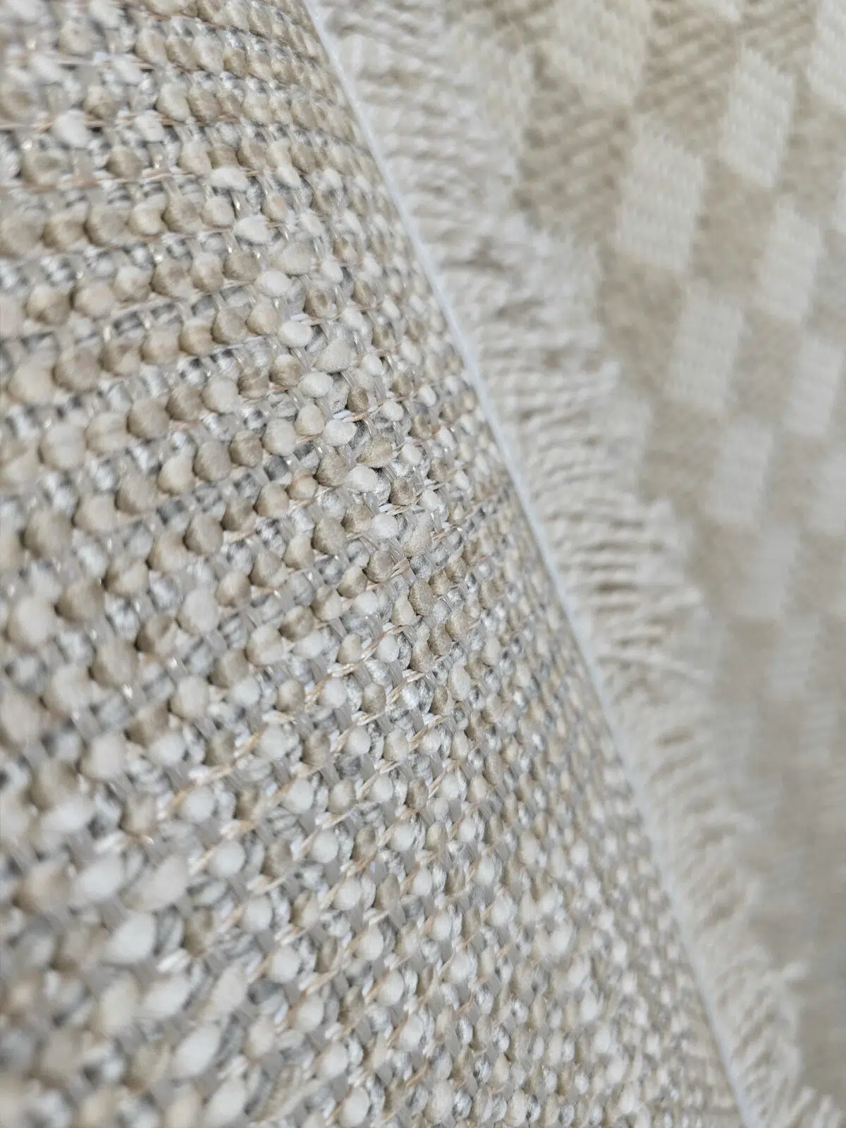 Underside view showing Helios rug fringes and backing details